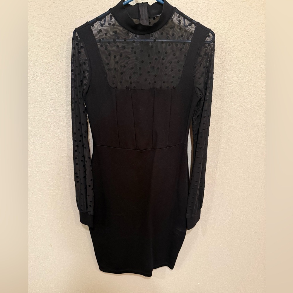 Elegant Black Dress with Sheer Polka Dot Sleeves